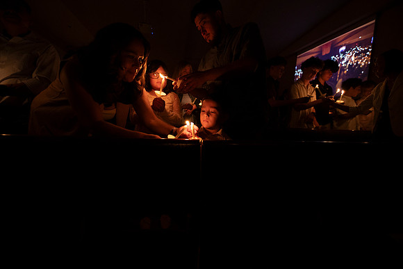 Holy Saturday At the Easter Vigil in the Holy Night of Easter at St. Patrick Community Church