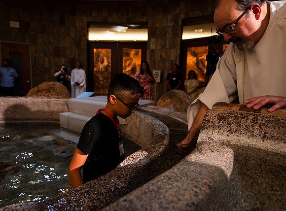 Holy Saturday At the Easter Vigil in the Holy Night of Easter at St. Patrick Community Church