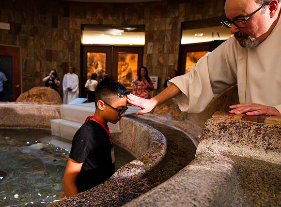 Holy Saturday At the Easter Vigil in the Holy Night of Easter at St. Patrick Community Church