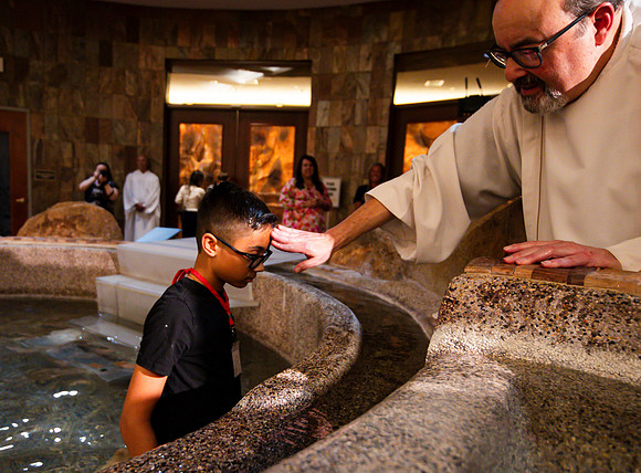 Holy Saturday At the Easter Vigil in the Holy Night of Easter at St. Patrick Community Church