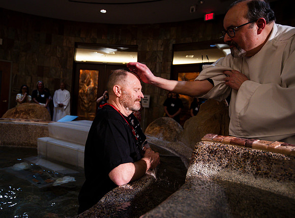 Holy Saturday At the Easter Vigil in the Holy Night of Easter at St. Patrick Community Church