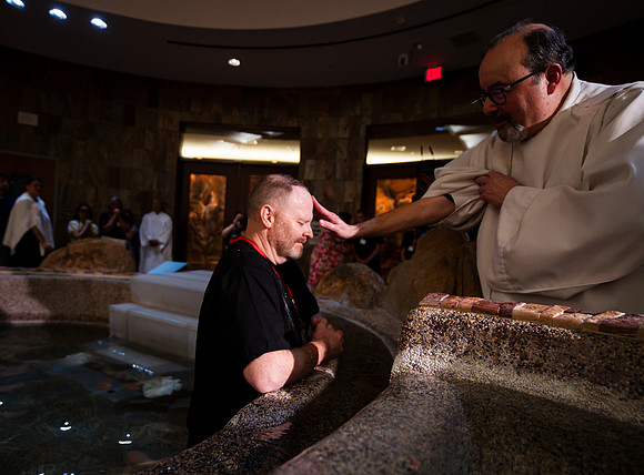 Holy Saturday At the Easter Vigil in the Holy Night of Easter at St. Patrick Community Church