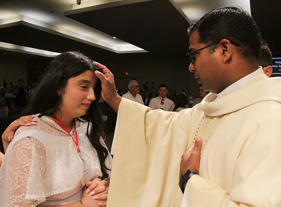 Holy Saturday At the Easter Vigil in the Holy Night of Easter at St. Patrick Community Church