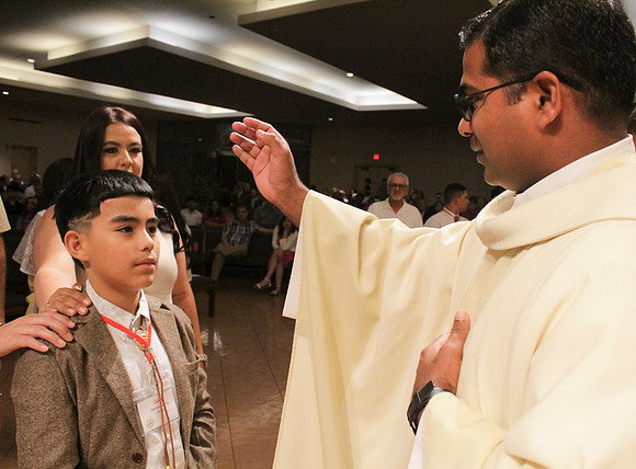 Holy Saturday At the Easter Vigil in the Holy Night of Easter at St. Patrick Community Church