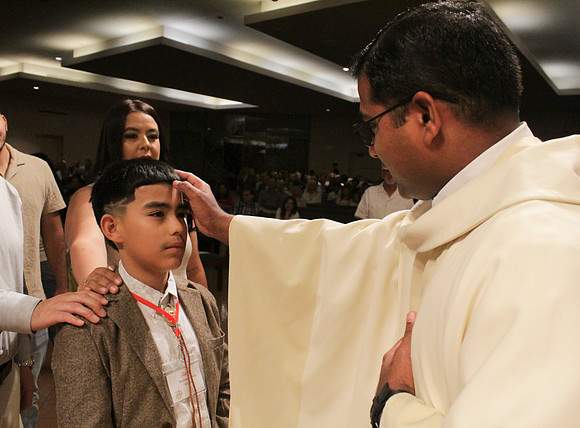 Holy Saturday At the Easter Vigil in the Holy Night of Easter at St. Patrick Community Church