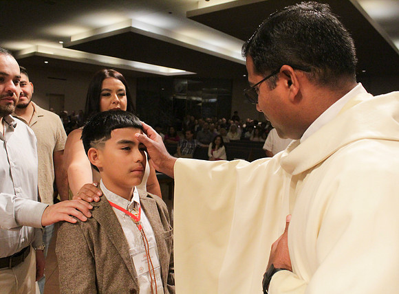 Holy Saturday At the Easter Vigil in the Holy Night of Easter at St. Patrick Community Church