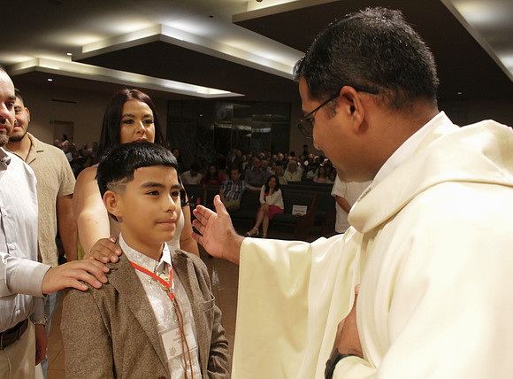 Holy Saturday At the Easter Vigil in the Holy Night of Easter at St. Patrick Community Church