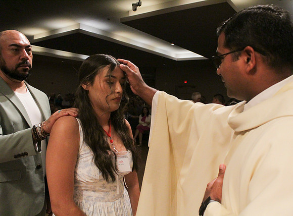 Holy Saturday At the Easter Vigil in the Holy Night of Easter at St. Patrick Community Church