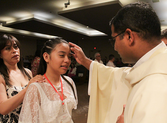 Holy Saturday At the Easter Vigil in the Holy Night of Easter at St. Patrick Community Church