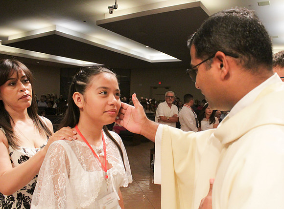Holy Saturday At the Easter Vigil in the Holy Night of Easter at St. Patrick Community Church
