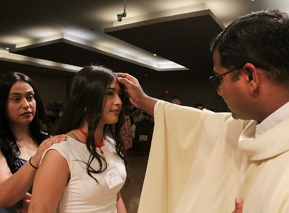 Holy Saturday At the Easter Vigil in the Holy Night of Easter at St. Patrick Community Church