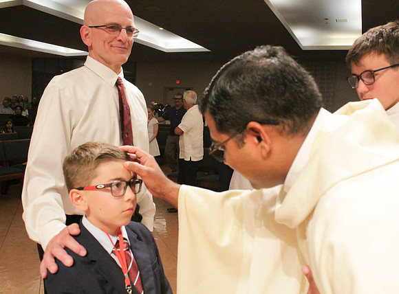 Holy Saturday At the Easter Vigil in the Holy Night of Easter at St. Patrick Community Church