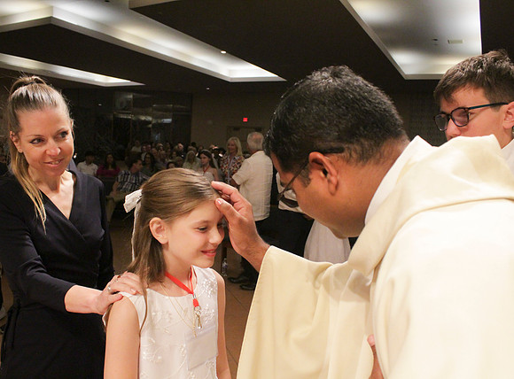 Holy Saturday At the Easter Vigil in the Holy Night of Easter at St. Patrick Community Church