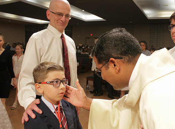 Holy Saturday At the Easter Vigil in the Holy Night of Easter at St. Patrick Community Church