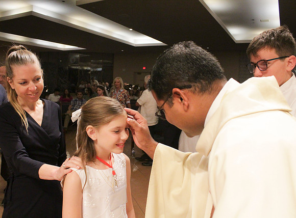 Holy Saturday At the Easter Vigil in the Holy Night of Easter at St. Patrick Community Church