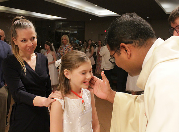 Holy Saturday At the Easter Vigil in the Holy Night of Easter at St. Patrick Community Church