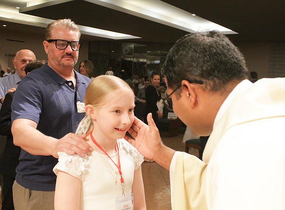 Holy Saturday At the Easter Vigil in the Holy Night of Easter at St. Patrick Community Church
