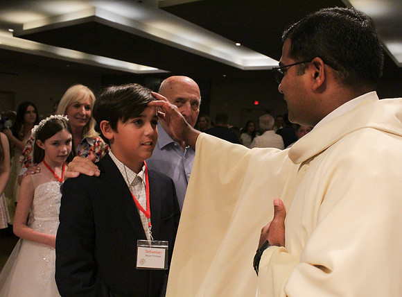 Holy Saturday At the Easter Vigil in the Holy Night of Easter at St. Patrick Community Church