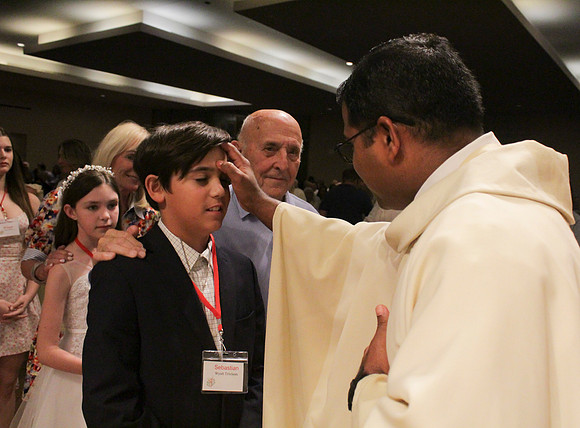 Holy Saturday At the Easter Vigil in the Holy Night of Easter at St. Patrick Community Church