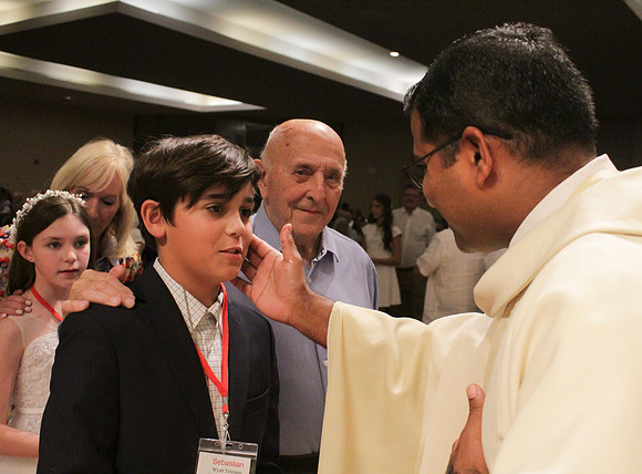 Holy Saturday At the Easter Vigil in the Holy Night of Easter at St. Patrick Community Church