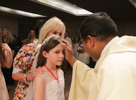 Holy Saturday At the Easter Vigil in the Holy Night of Easter at St. Patrick Community Church