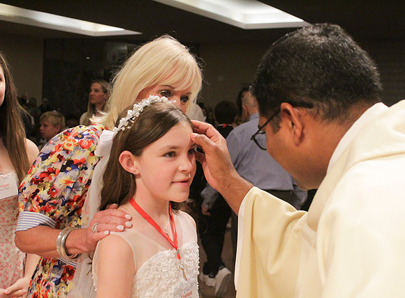 Holy Saturday At the Easter Vigil in the Holy Night of Easter at St. Patrick Community Church
