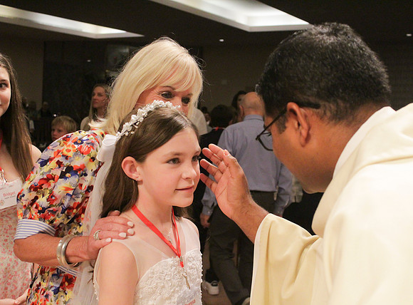 Holy Saturday At the Easter Vigil in the Holy Night of Easter at St. Patrick Community Church