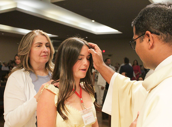 Holy Saturday At the Easter Vigil in the Holy Night of Easter at St. Patrick Community Church