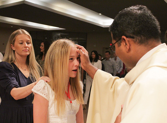 Holy Saturday At the Easter Vigil in the Holy Night of Easter at St. Patrick Community Church