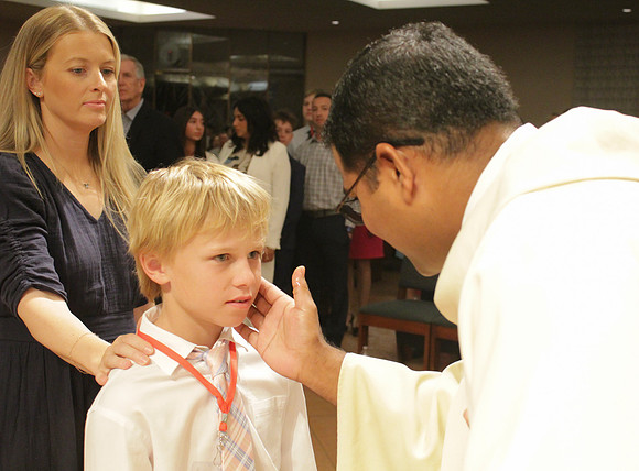 Holy Saturday At the Easter Vigil in the Holy Night of Easter at St. Patrick Community Church