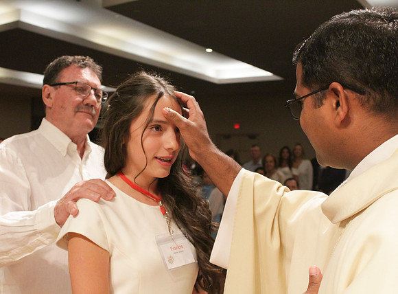 Holy Saturday At the Easter Vigil in the Holy Night of Easter at St. Patrick Community Church