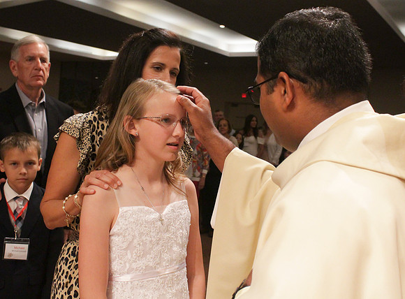 Holy Saturday At the Easter Vigil in the Holy Night of Easter at St. Patrick Community Church