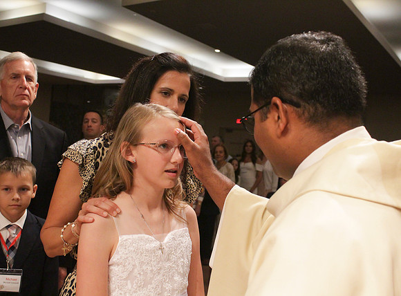 Holy Saturday At the Easter Vigil in the Holy Night of Easter at St. Patrick Community Church