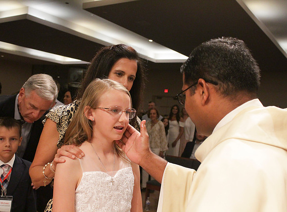 Holy Saturday At the Easter Vigil in the Holy Night of Easter at St. Patrick Community Church