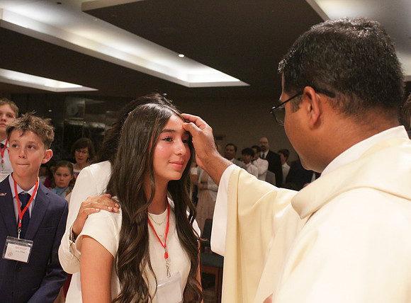 Holy Saturday At the Easter Vigil in the Holy Night of Easter at St. Patrick Community Church