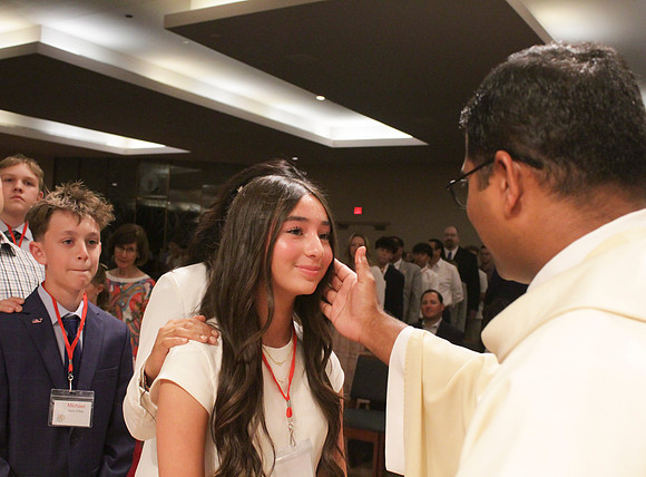 Holy Saturday At the Easter Vigil in the Holy Night of Easter at St. Patrick Community Church