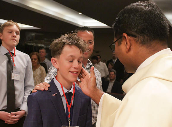 Holy Saturday At the Easter Vigil in the Holy Night of Easter at St. Patrick Community Church