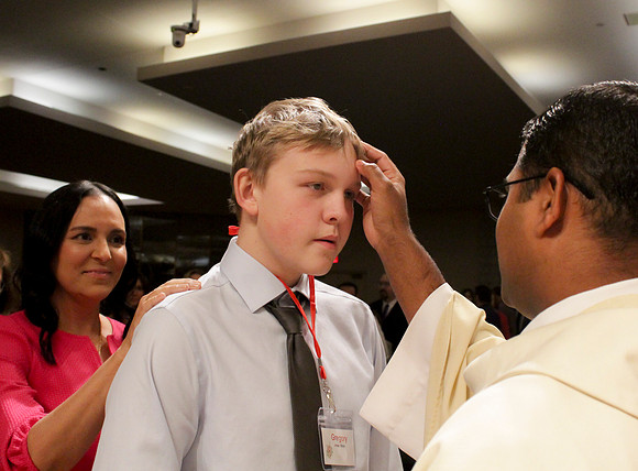 Holy Saturday At the Easter Vigil in the Holy Night of Easter at St. Patrick Community Church