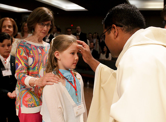 Holy Saturday At the Easter Vigil in the Holy Night of Easter at St. Patrick Community Church