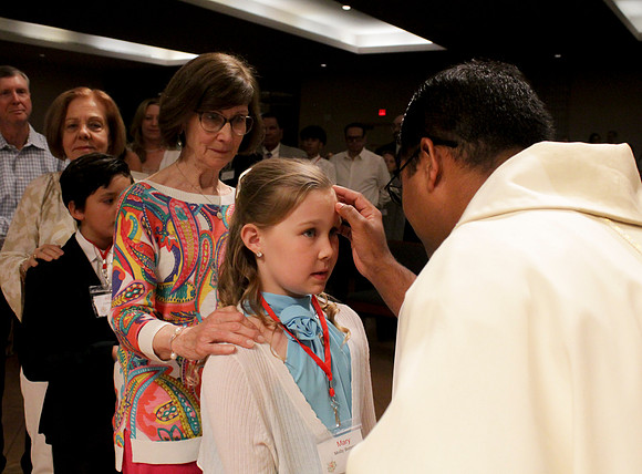Holy Saturday At the Easter Vigil in the Holy Night of Easter at St. Patrick Community Church