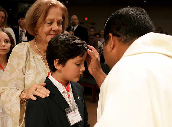 Holy Saturday At the Easter Vigil in the Holy Night of Easter at St. Patrick Community Church
