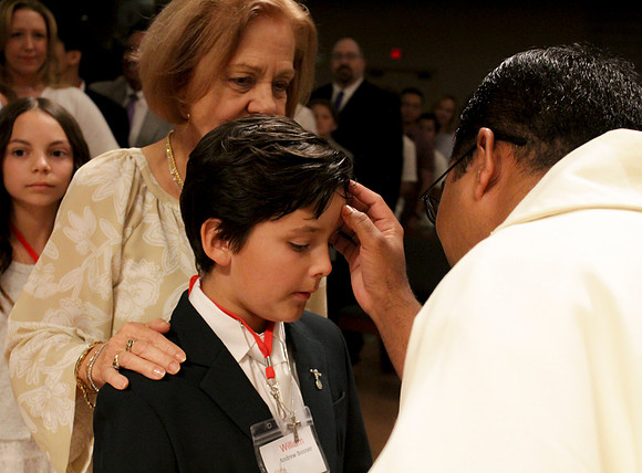 Holy Saturday At the Easter Vigil in the Holy Night of Easter at St. Patrick Community Church