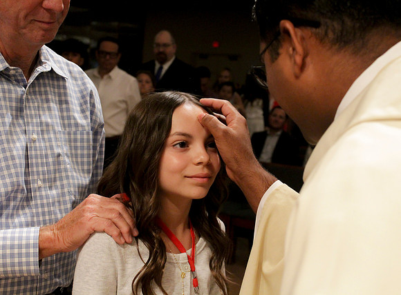 Holy Saturday At the Easter Vigil in the Holy Night of Easter at St. Patrick Community Church
