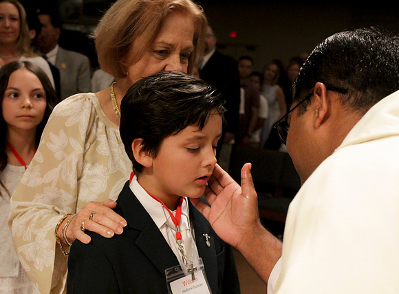 Holy Saturday At the Easter Vigil in the Holy Night of Easter at St. Patrick Community Church