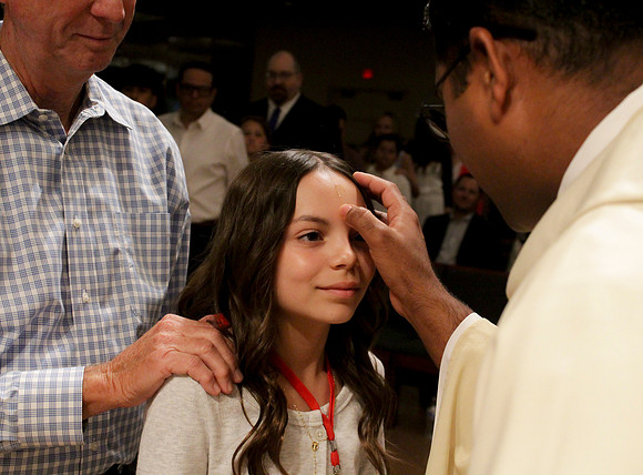 Holy Saturday At the Easter Vigil in the Holy Night of Easter at St. Patrick Community Church
