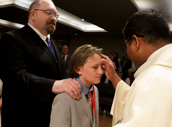 Holy Saturday At the Easter Vigil in the Holy Night of Easter at St. Patrick Community Church