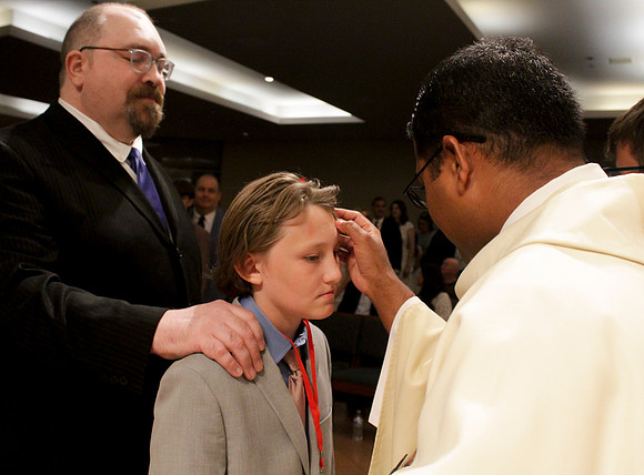 Holy Saturday At the Easter Vigil in the Holy Night of Easter at St. Patrick Community Church
