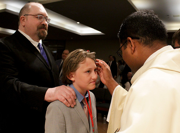 Holy Saturday At the Easter Vigil in the Holy Night of Easter at St. Patrick Community Church