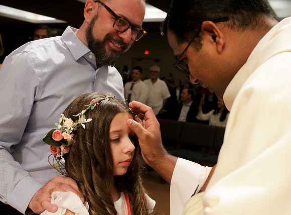 Holy Saturday At the Easter Vigil in the Holy Night of Easter at St. Patrick Community Church
