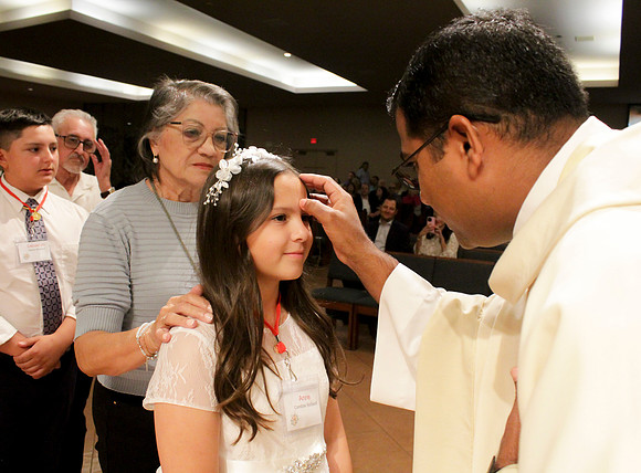 Holy Saturday At the Easter Vigil in the Holy Night of Easter at St. Patrick Community Church